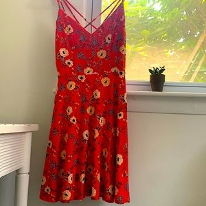 Coral floral mid length summer dress with cross back straps. Buttery soft fabric
